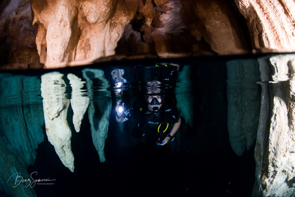 Diver facing the camera inside Chandelier Cave Palau